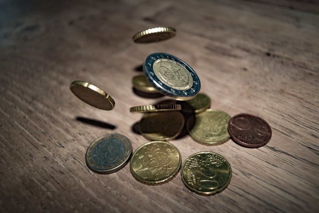 moedas representando pagamentos